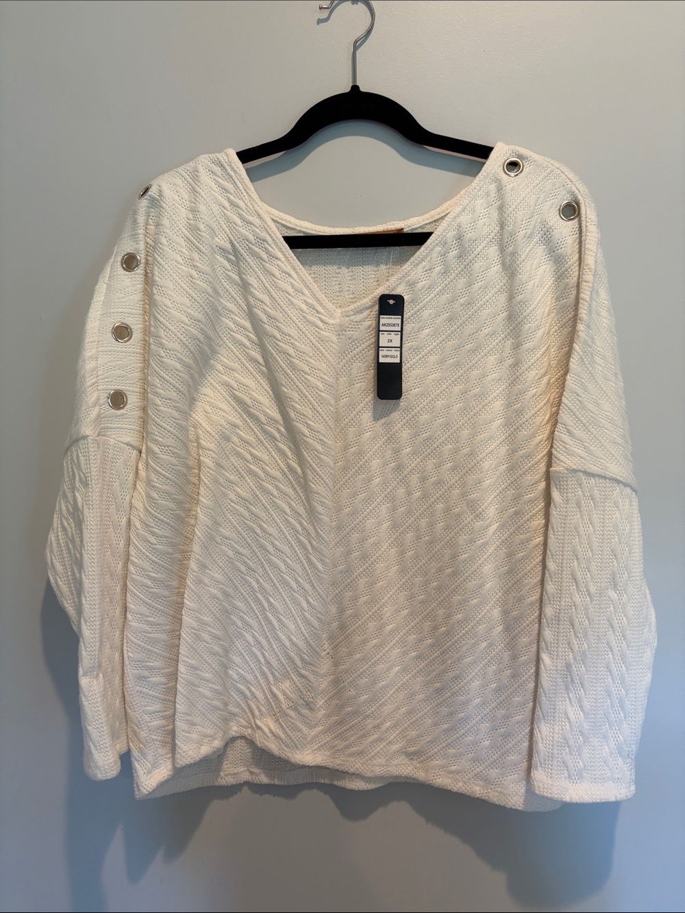 Belldini Ivory V-Neck Cable Knit Sweater with Grommet Shoulder Detail